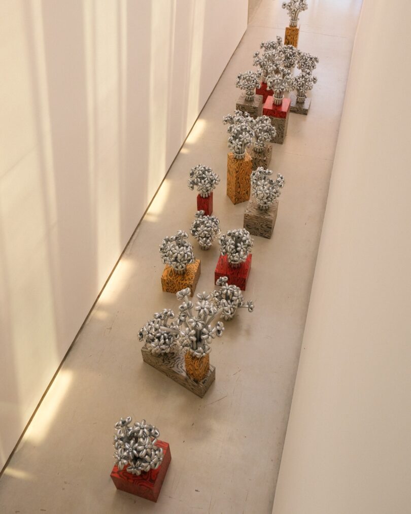 A large installation of natural biodegradable latex balloon flowers.